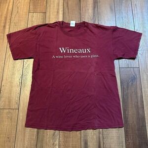 Burgundy red wineaux a wine lover‎ who uses a glass tee large
